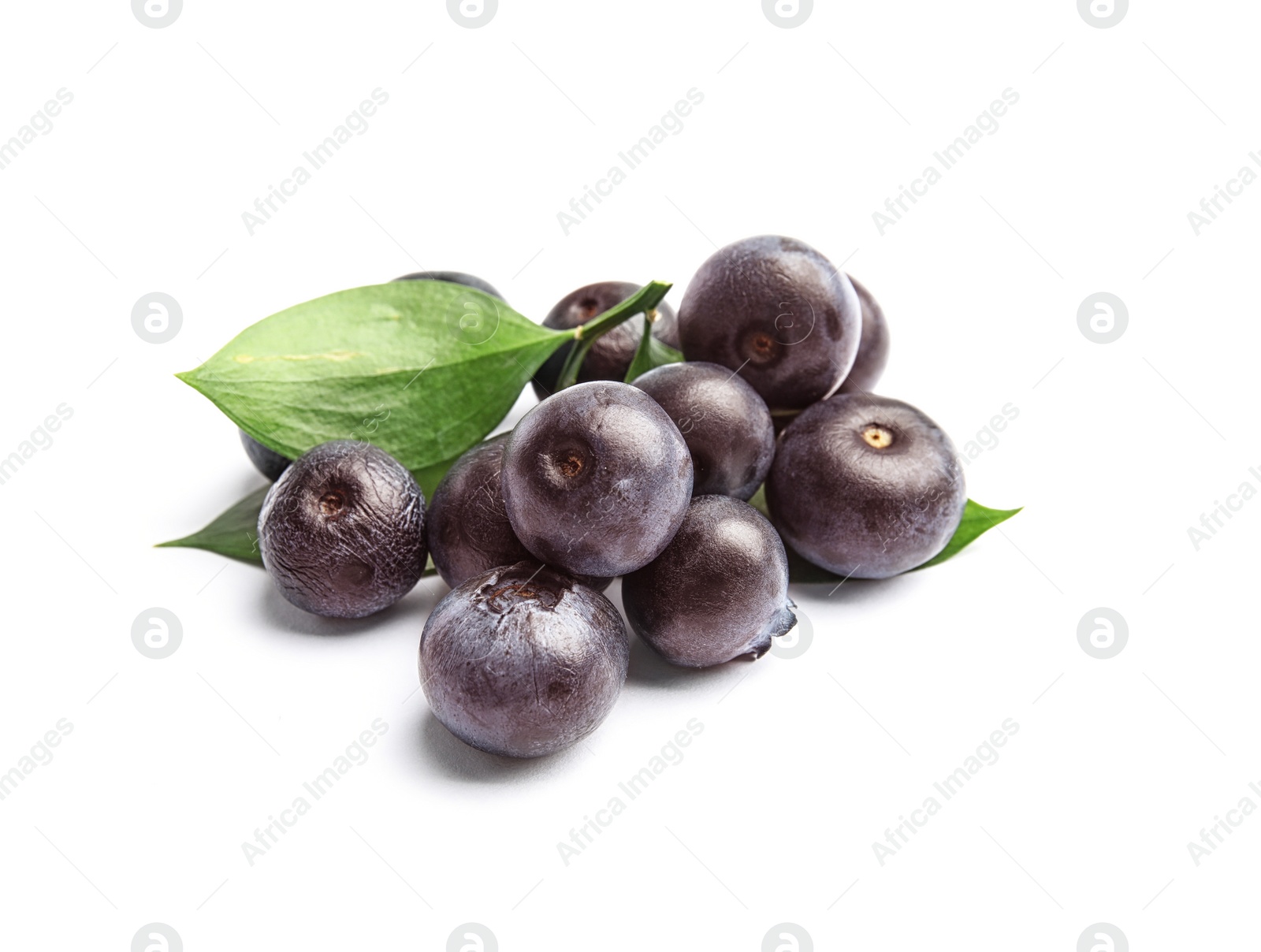 Photo of Fresh acai berries with leaves on white background