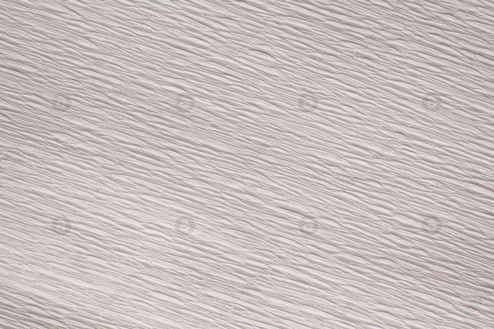 Photo of Texture of white paper sheet as background, closeup