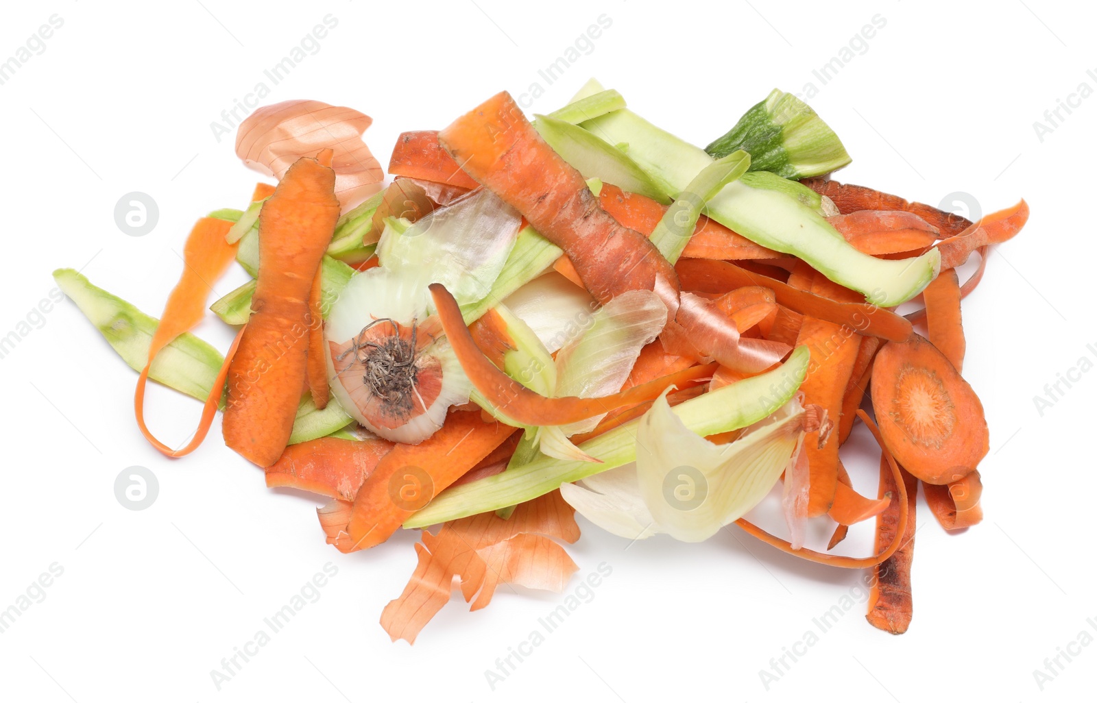 Photo of Peels of fresh vegetables isolated on white, above view