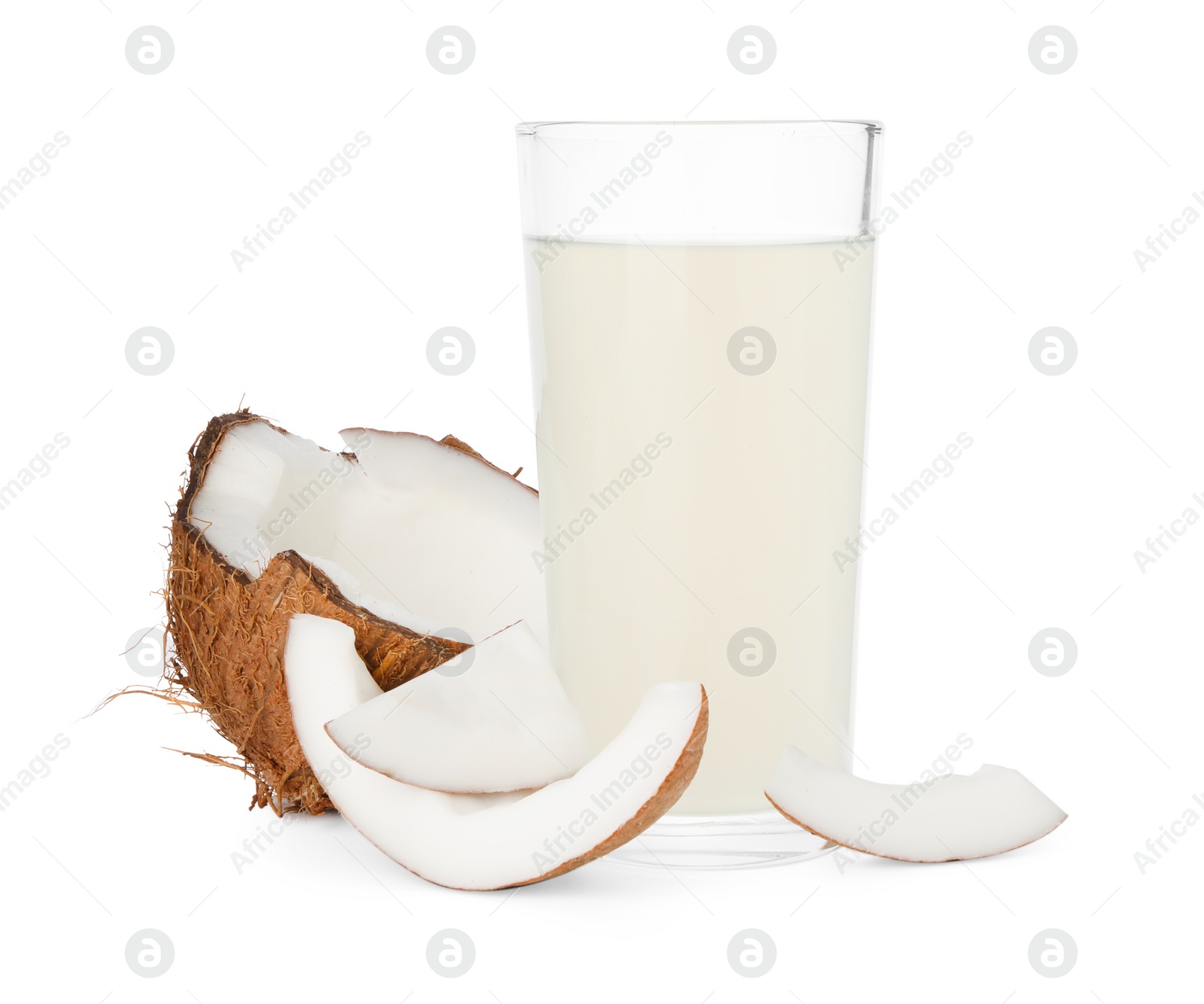 Photo of Glass of coconut water and nuts isolated on white