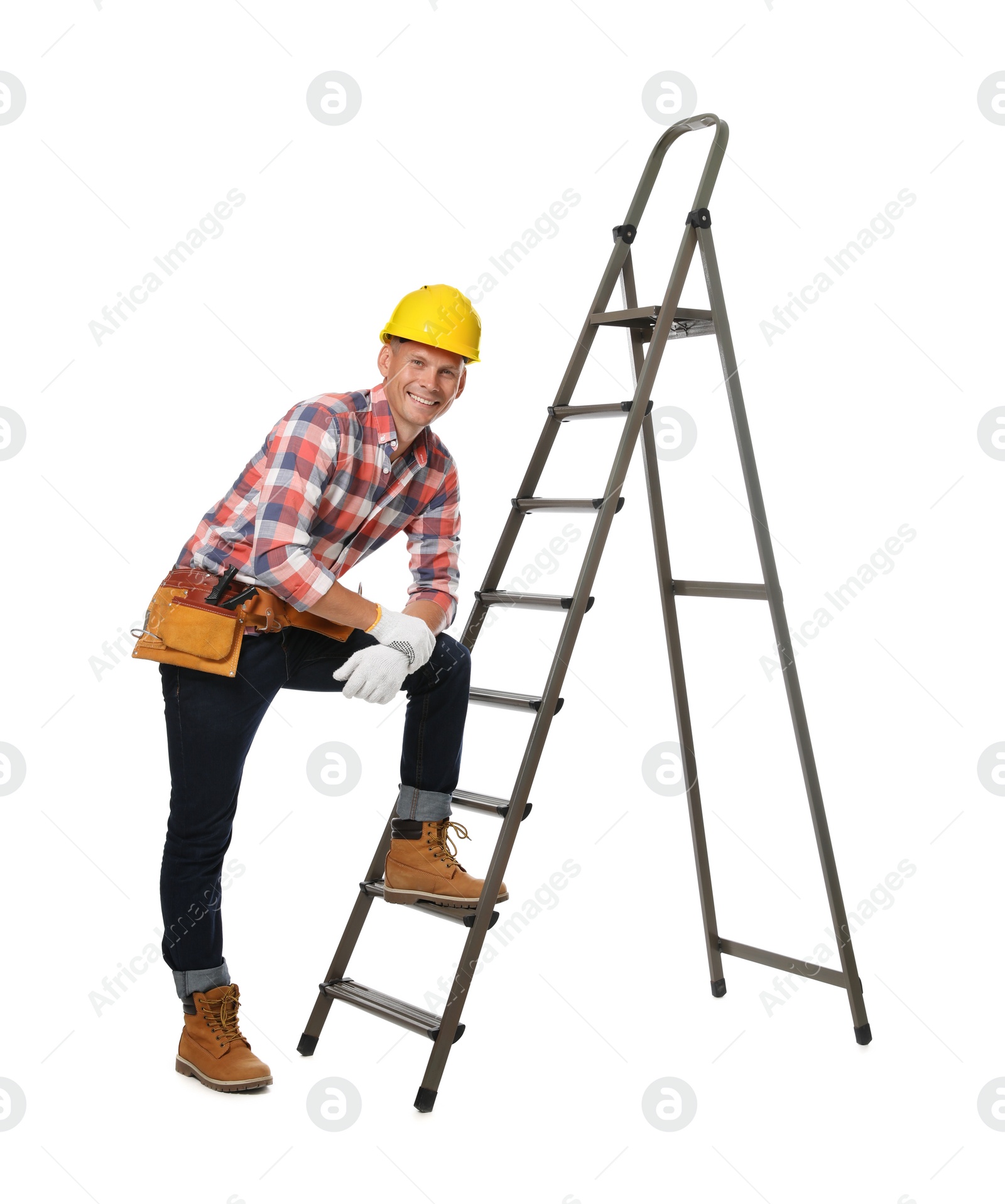 Photo of Professional constructor near ladder on white background