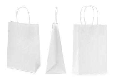 Image of Set with paper bags on white background