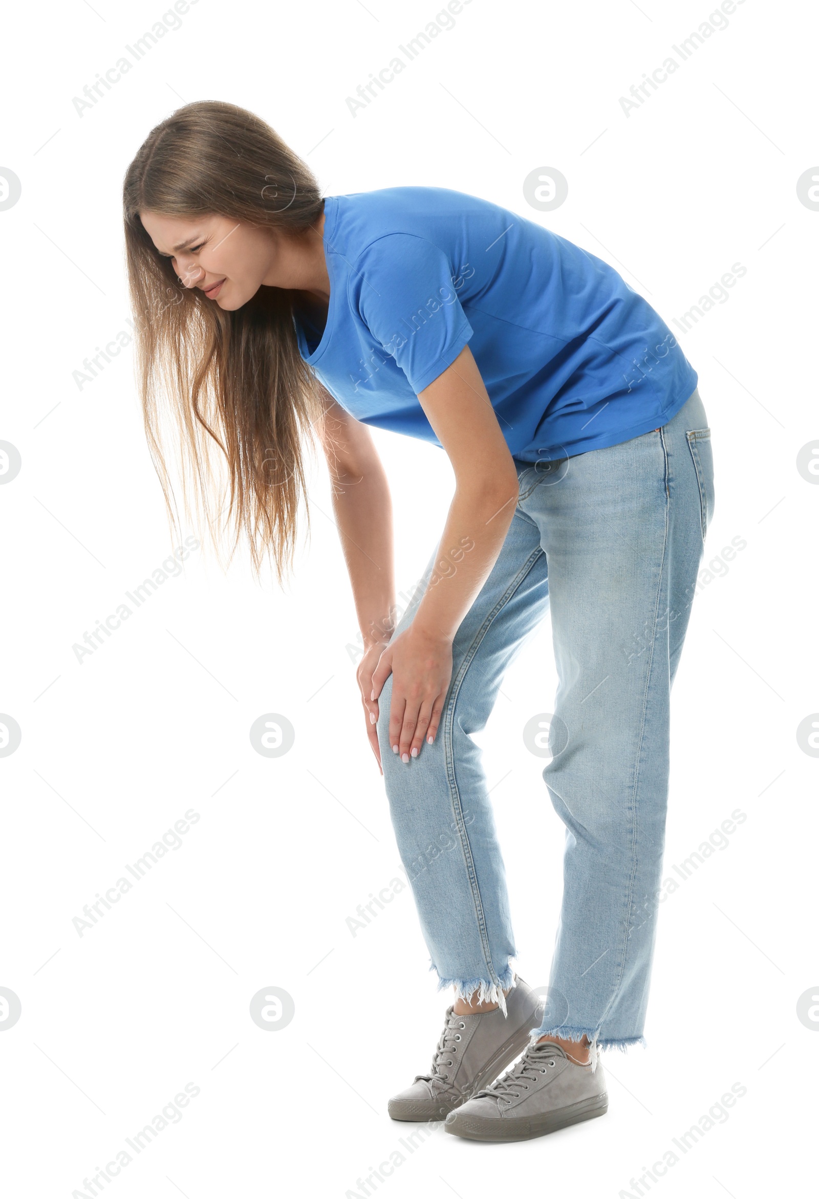 Photo of Full length portrait of woman having knee problems on white background