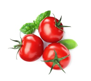 Photo of Fresh green basil leaves and tomatoes on white background, top view