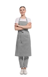 Photo of Beautiful young woman in clean apron on white background