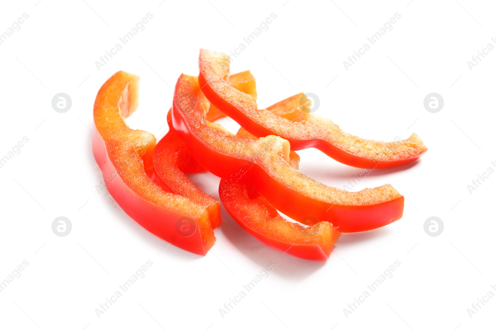 Photo of Slices of ripe red bell pepper on white background