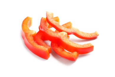 Slices of ripe red bell pepper on white background