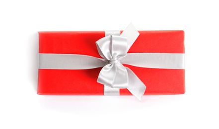 Beautifully wrapped gift box on white background, top view