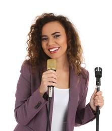 Photo of African-American woman in suit posing with microphone on white background