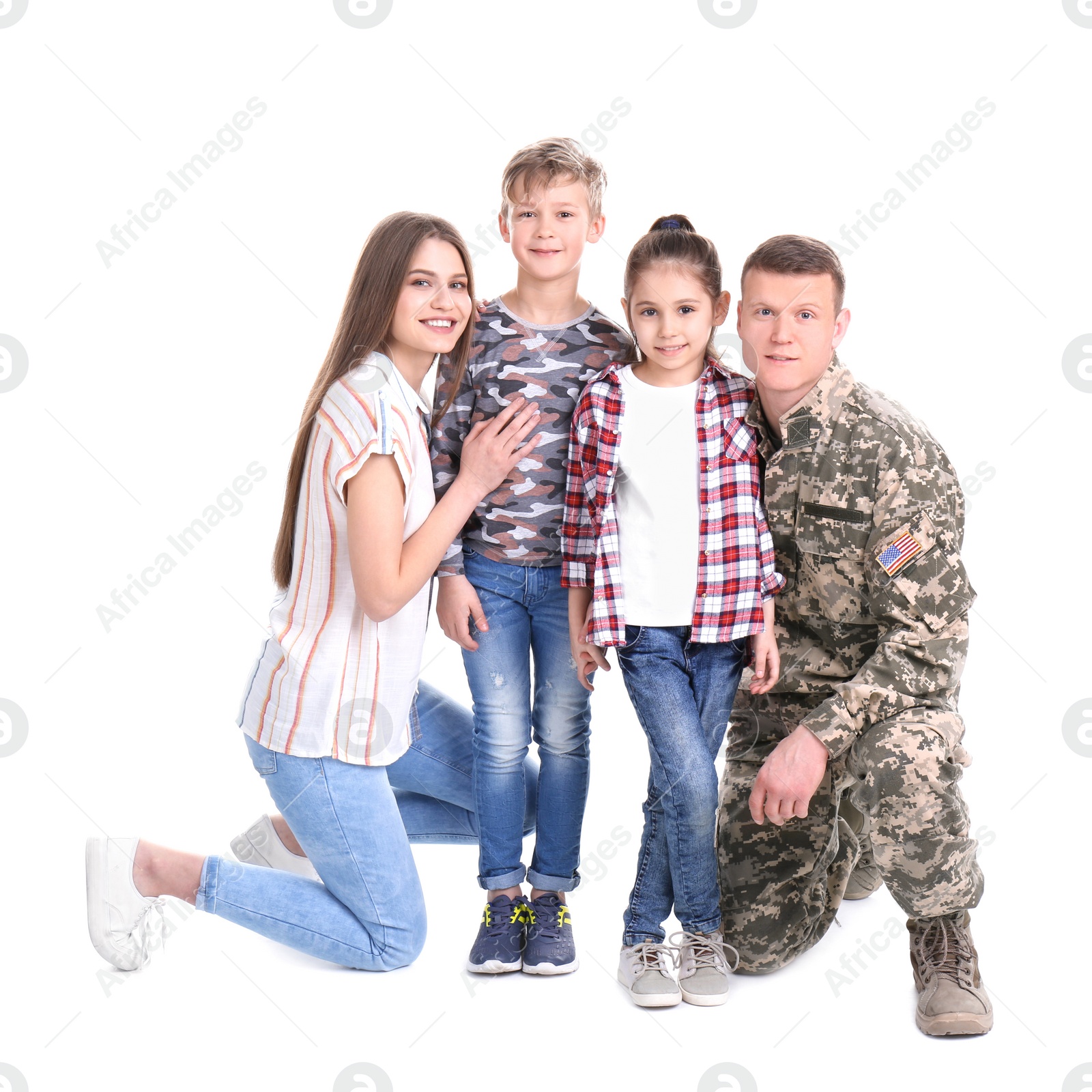 Photo of Male soldier with his family on white background. Military service