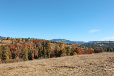 Picturesque landscape with blue sky over mountains