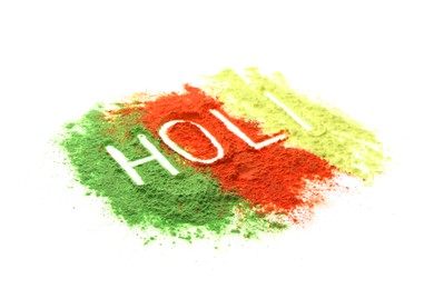 Photo of Colorful powders with word Holi on white background
