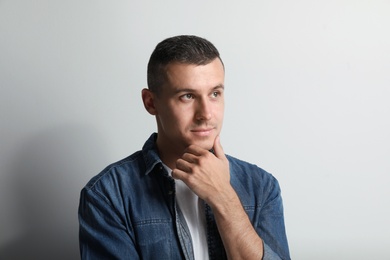 Portrait of handsome man on white background