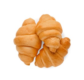 Photo of Delicious fresh croissants isolated on white, top view