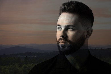Image of Double exposure of handsome man and forest in mountains at sunset