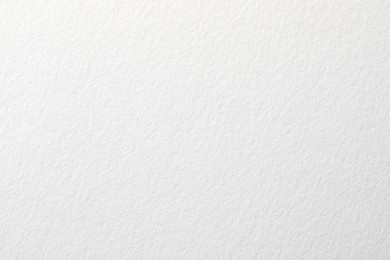 Texture of white paper sheet as background, closeup