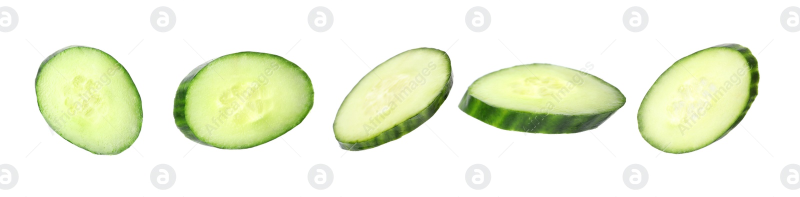 Image of Set of fresh cucumber slices on white background. Banner design