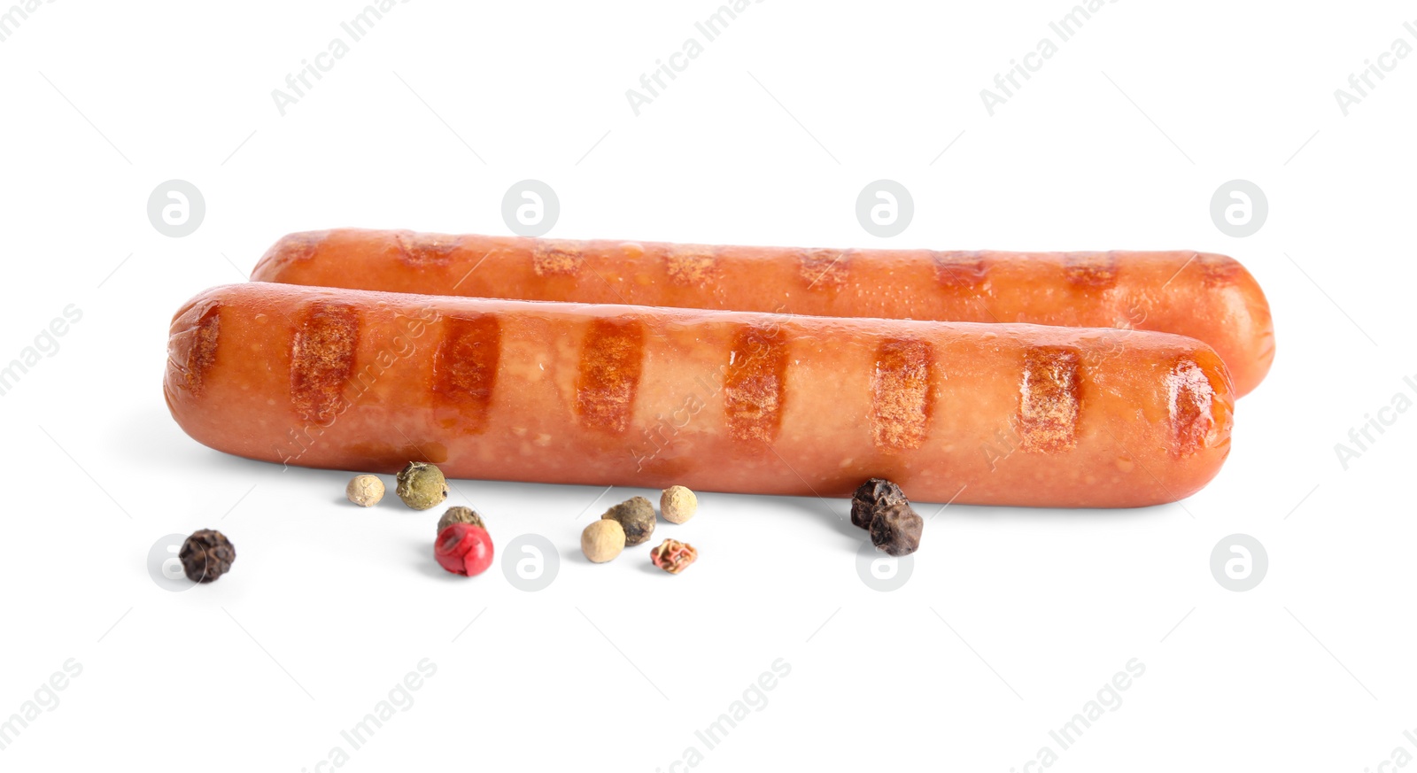 Photo of Tasty grilled sausages and peppercorns on white background