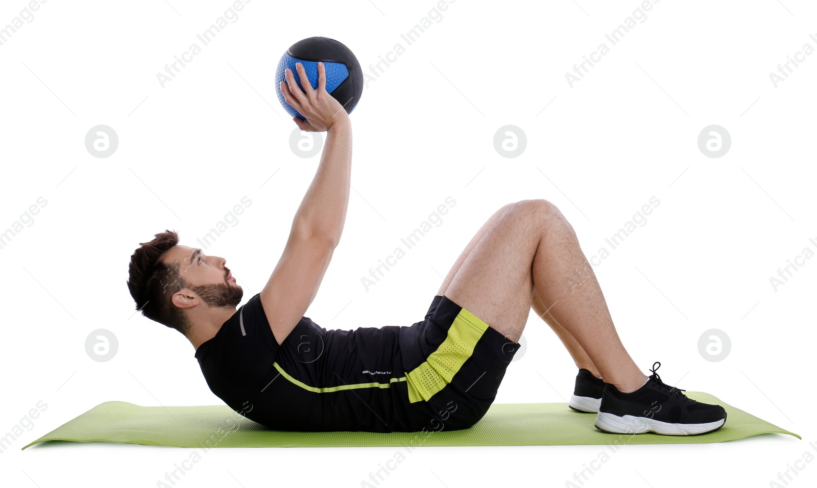 Photo of Athletic man doing exercise with medicine ball isolated on white