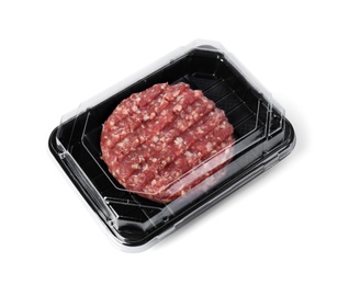 Photo of Plastic container with raw meat cutlet for burger isolated on white