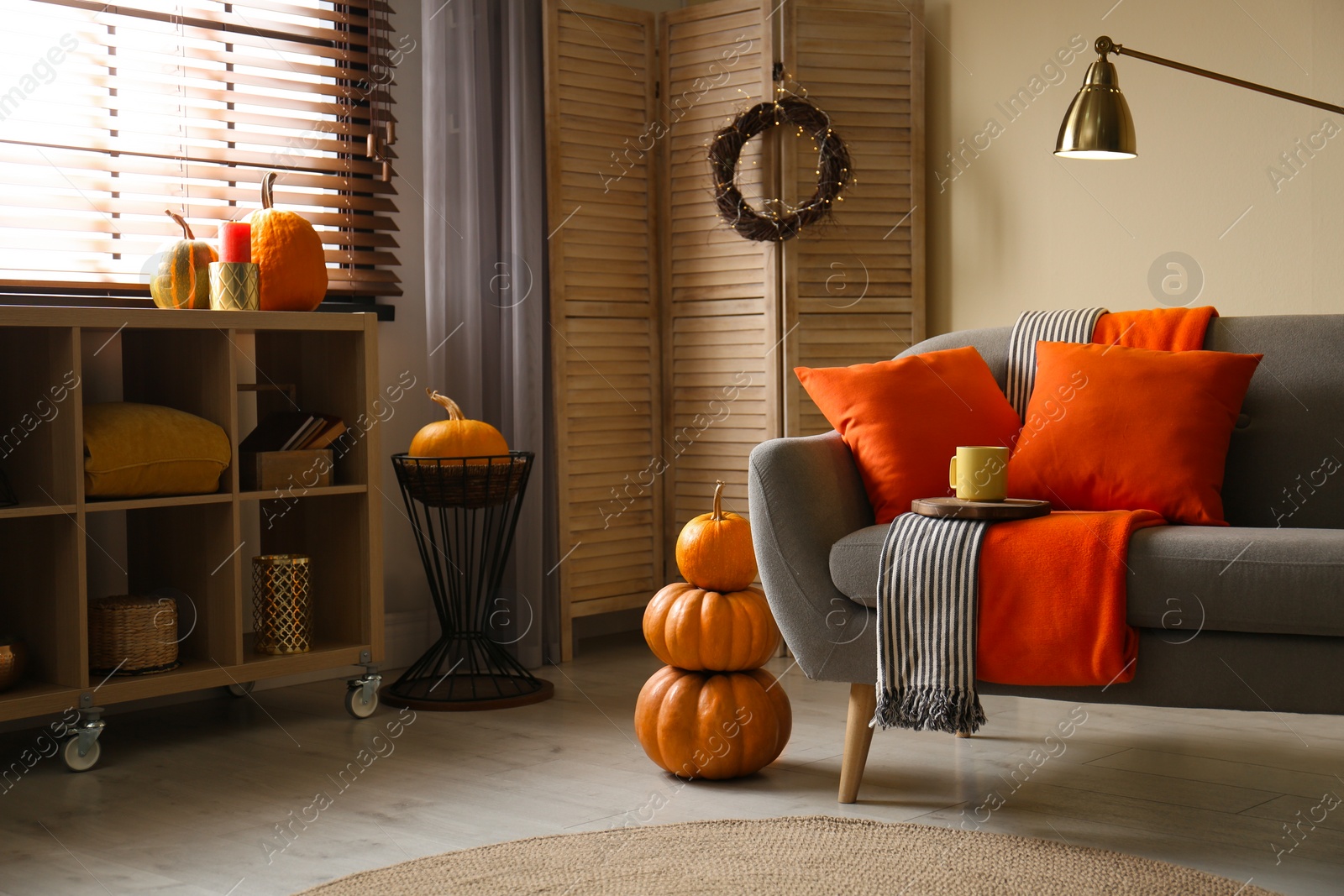 Photo of Cozy living room interior inspired by autumn colors