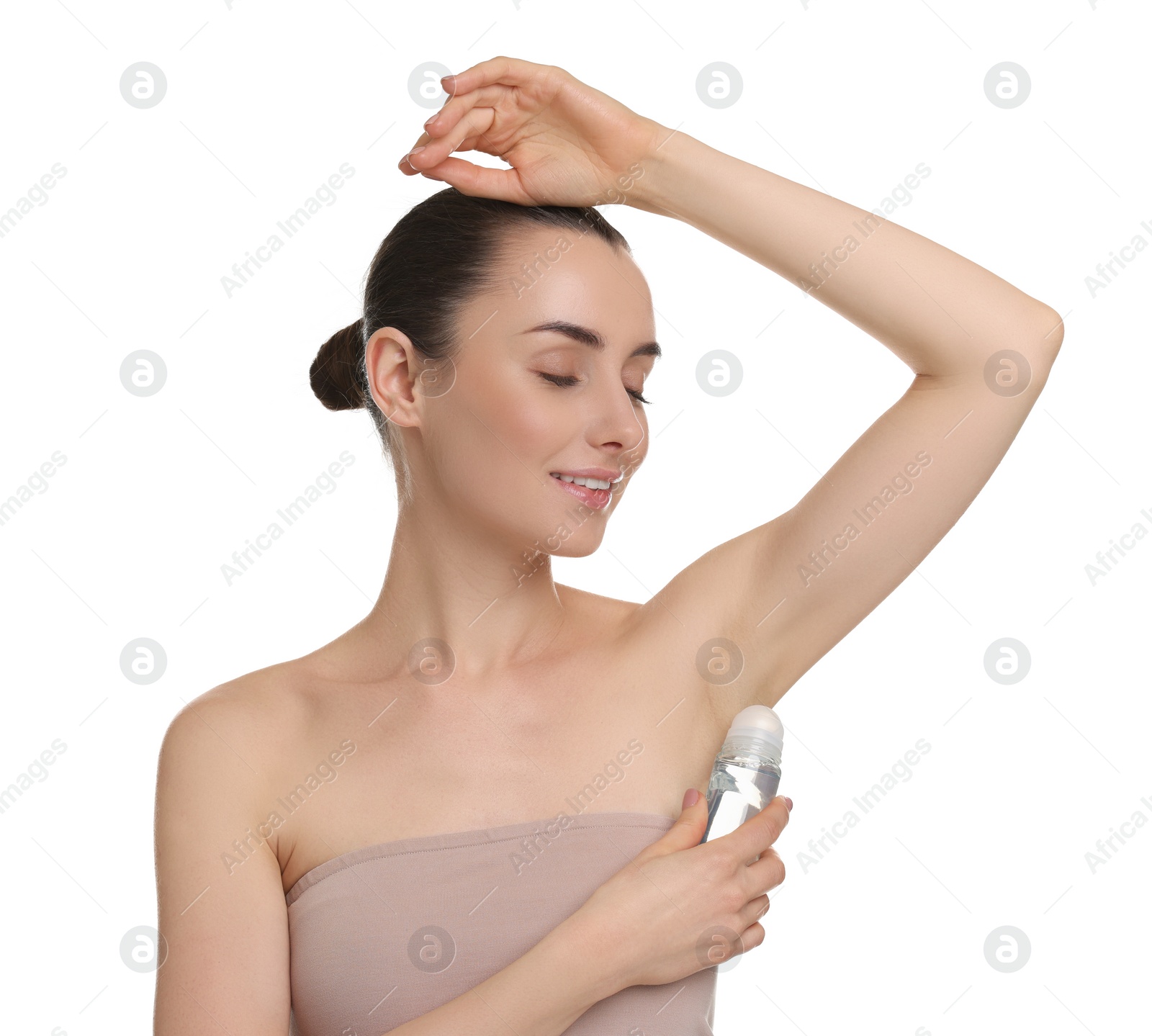 Photo of Beautiful woman applying deodorant on white background