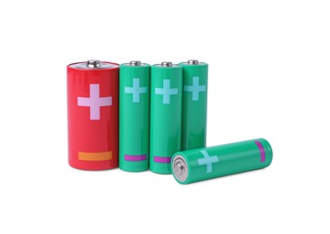 Photo of New AA and C size batteries isolated on white