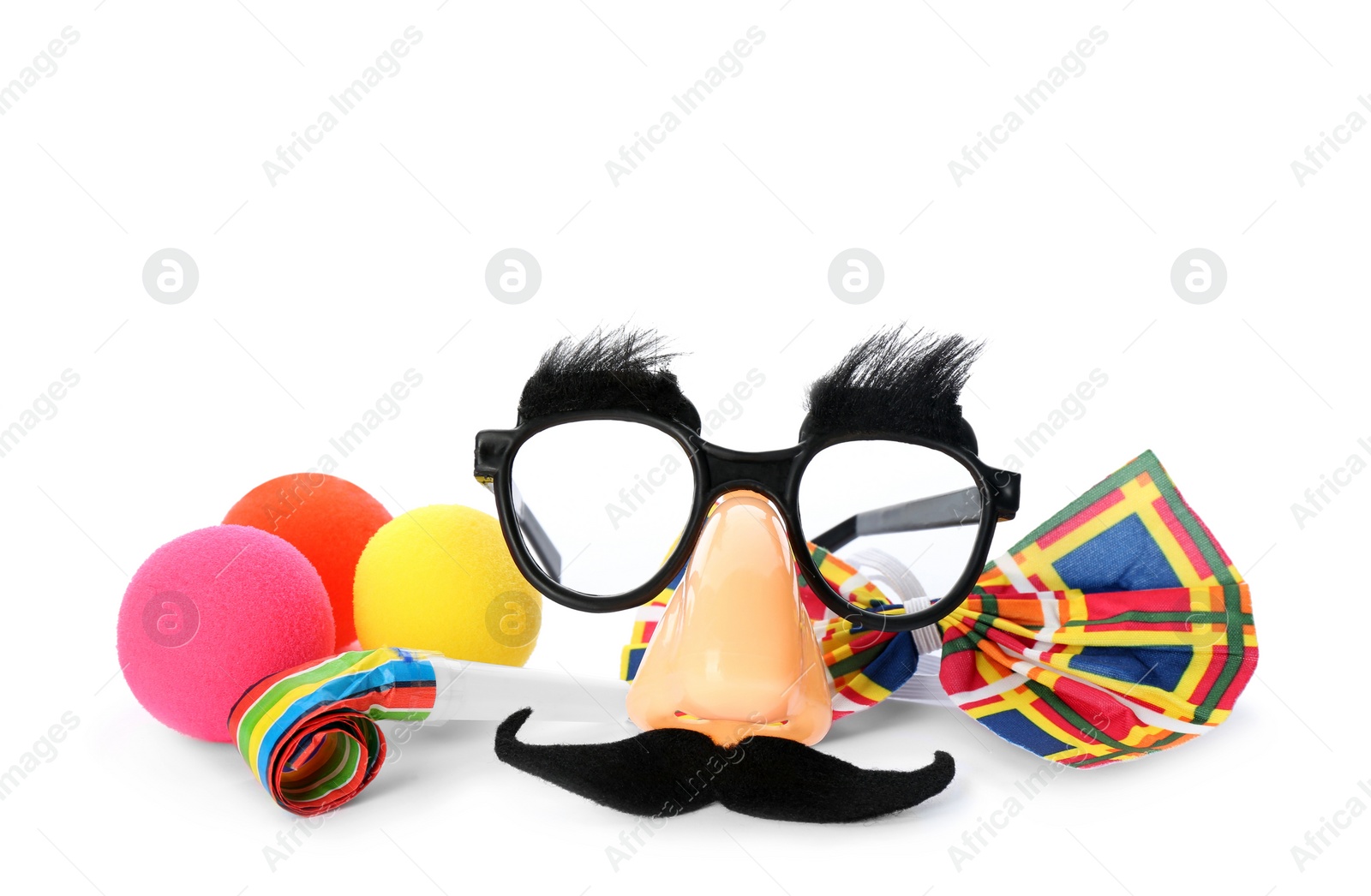 Photo of Different funny clown's accessories on white background