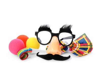 Photo of Different funny clown's accessories on white background