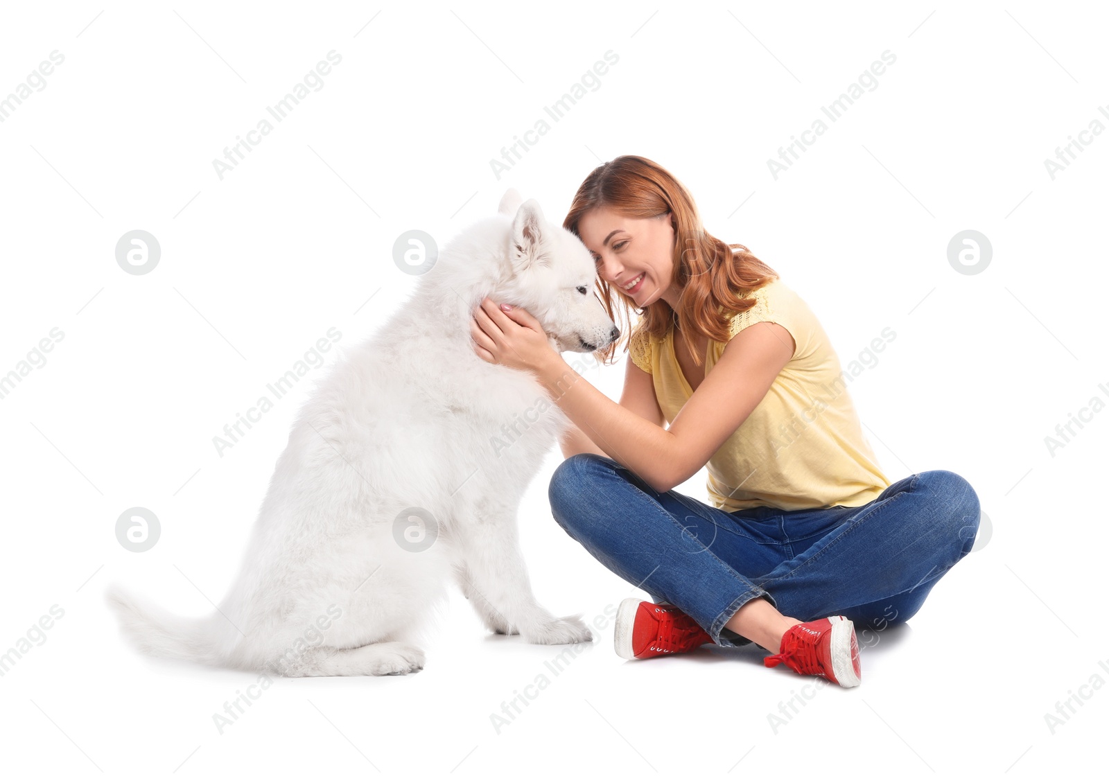 Photo of Beautiful woman with her cute dog on white background