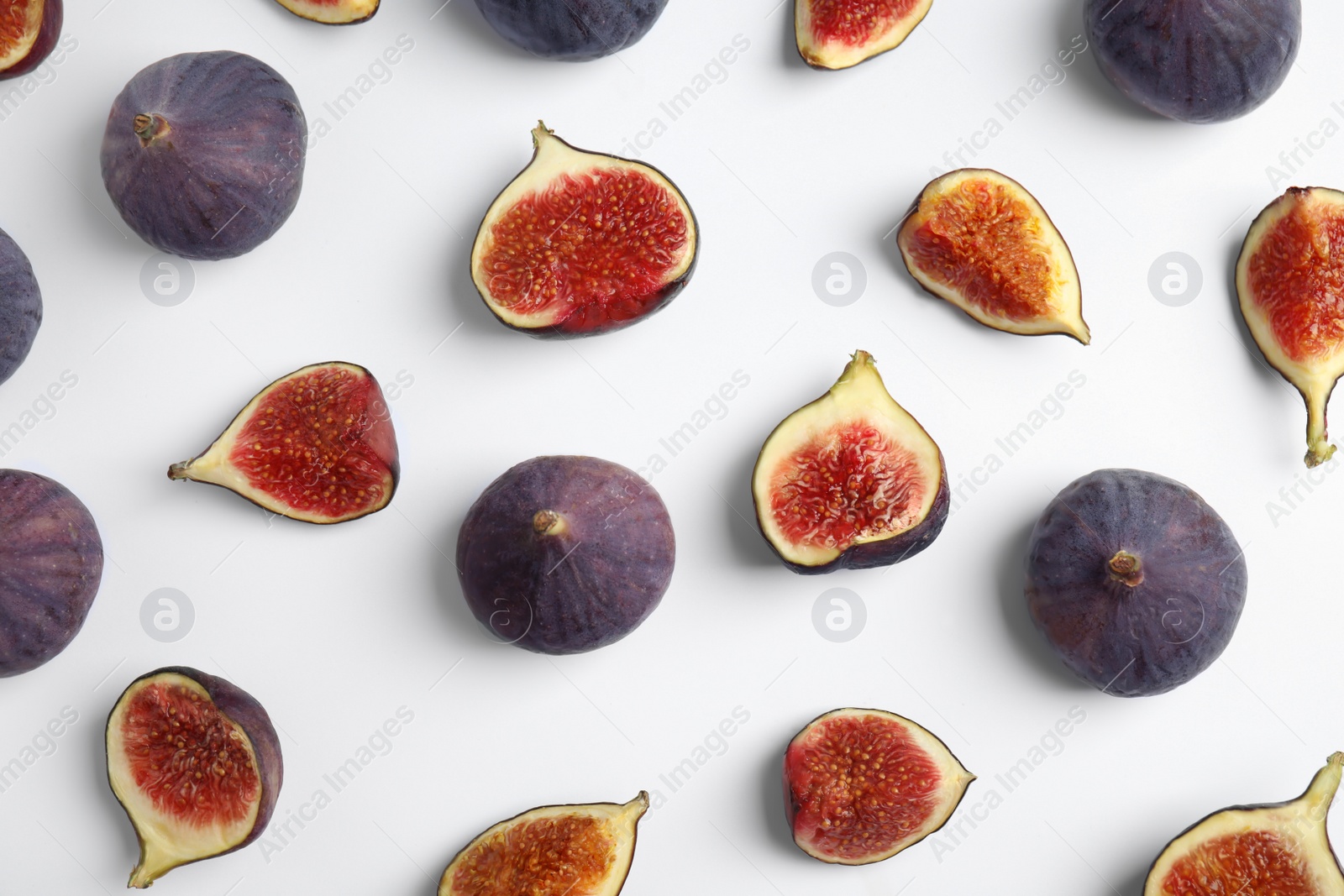 Photo of Delicious figs on white background, top view