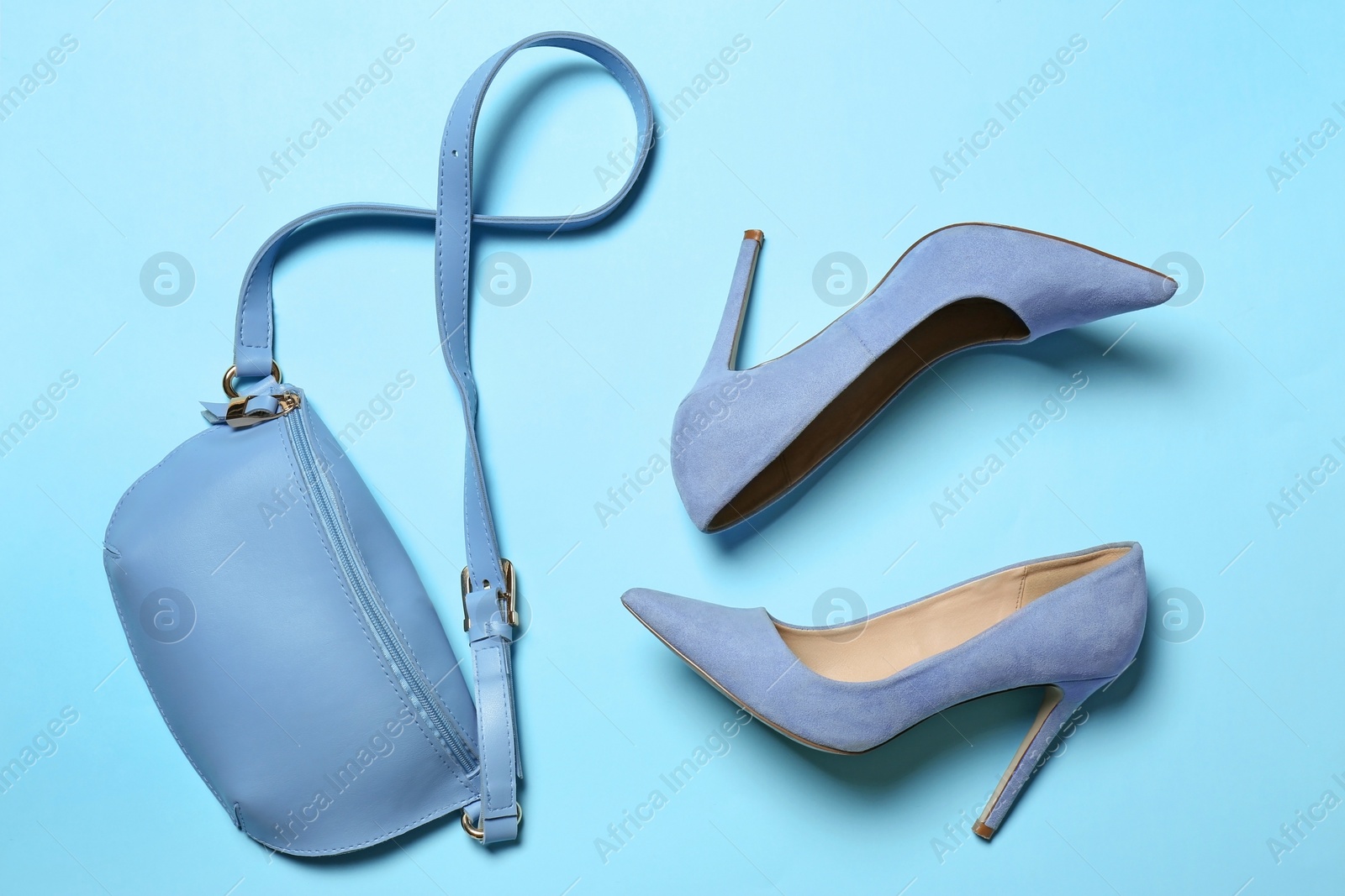 Photo of Flat lay composition with lady's shoes and bag on color background