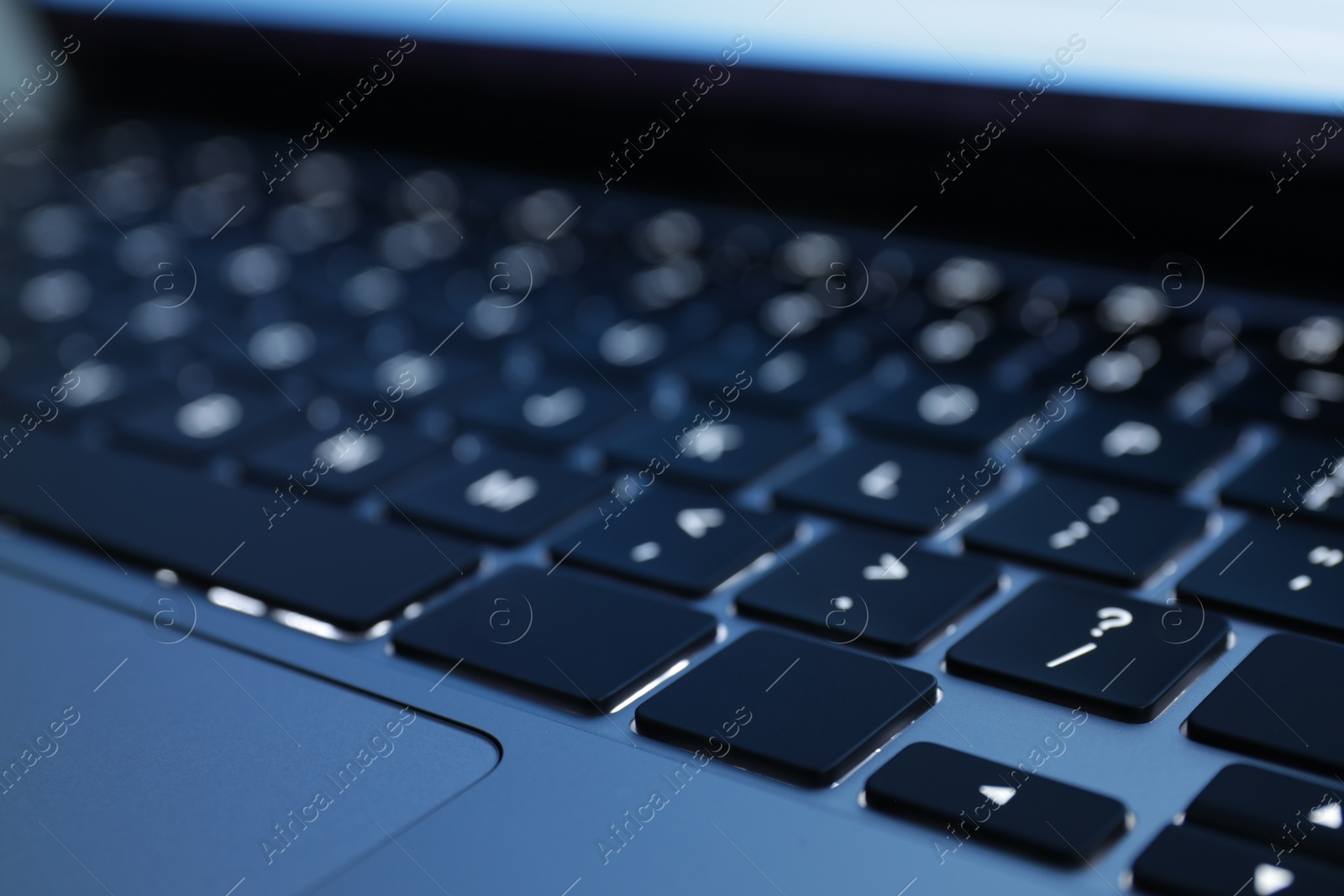 Photo of Keyboard of laptop, closeup view. Modern technology