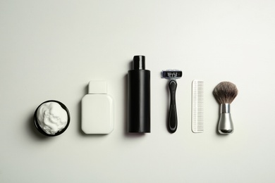 Photo of Flat lay composition with shaving accessories for men on white background