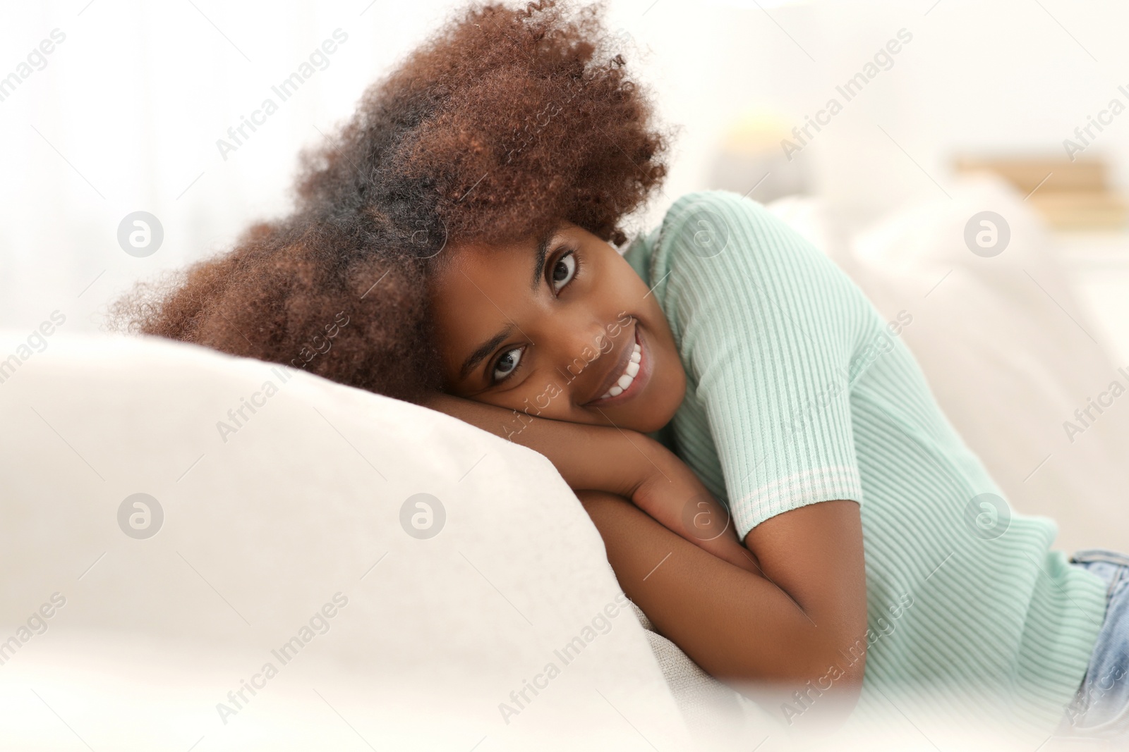 Photo of Portrait of smiling African American woman at home