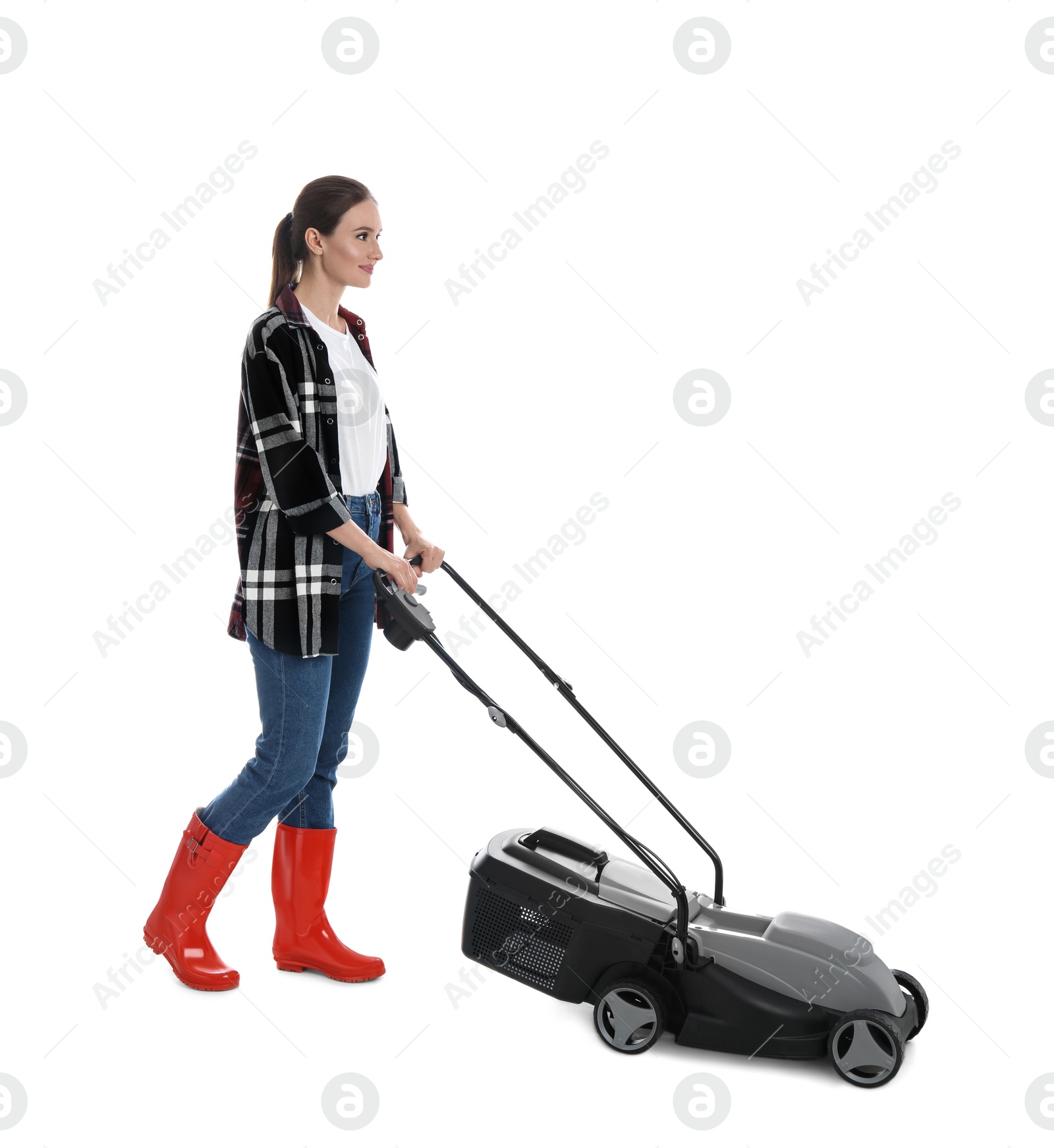 Photo of Young woman with modern lawn mower on white background