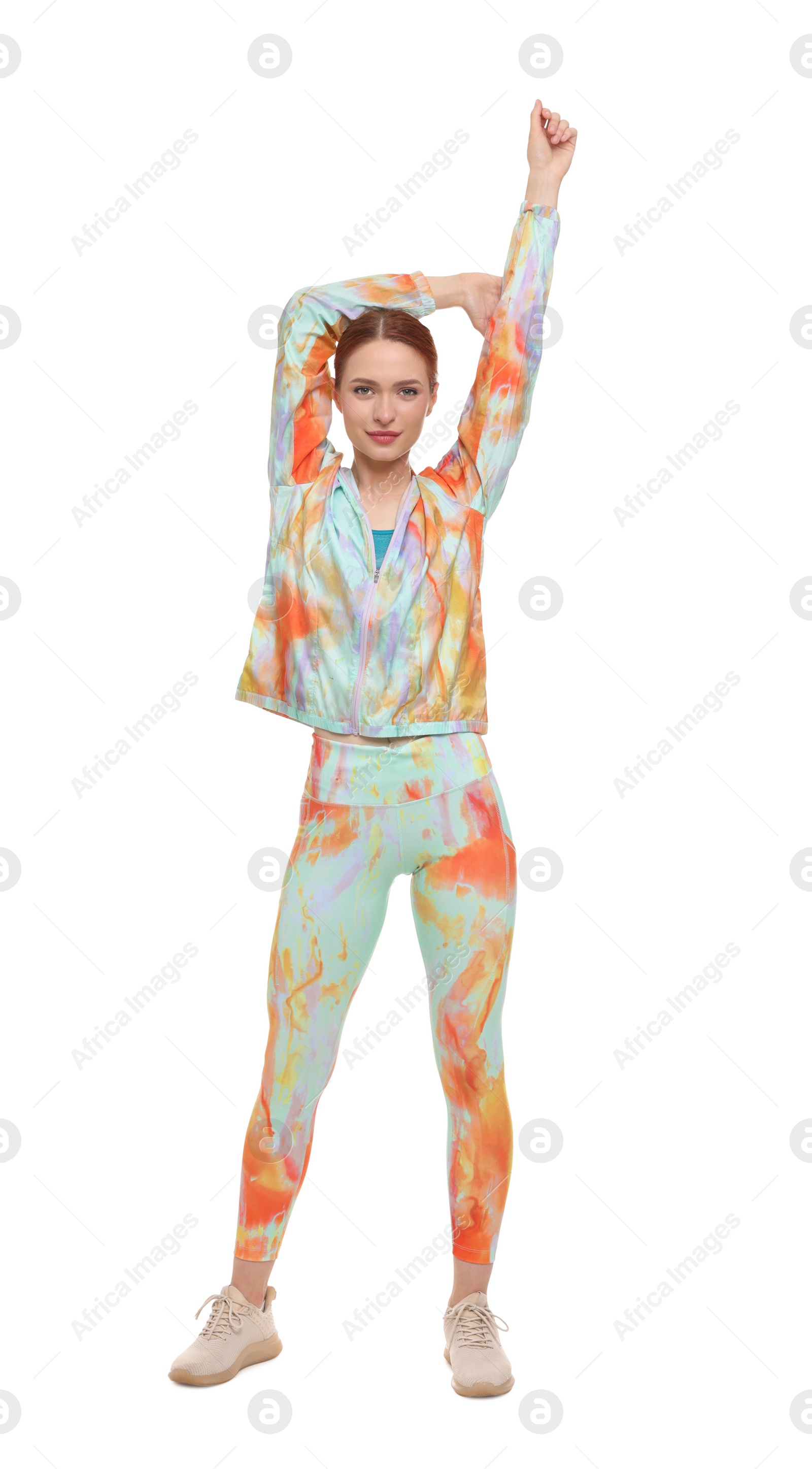 Photo of Young woman wearing sportswear on white background