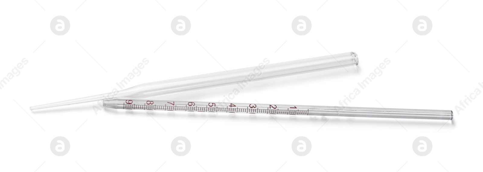 Photo of Two clean pipettes isolated on white, top view