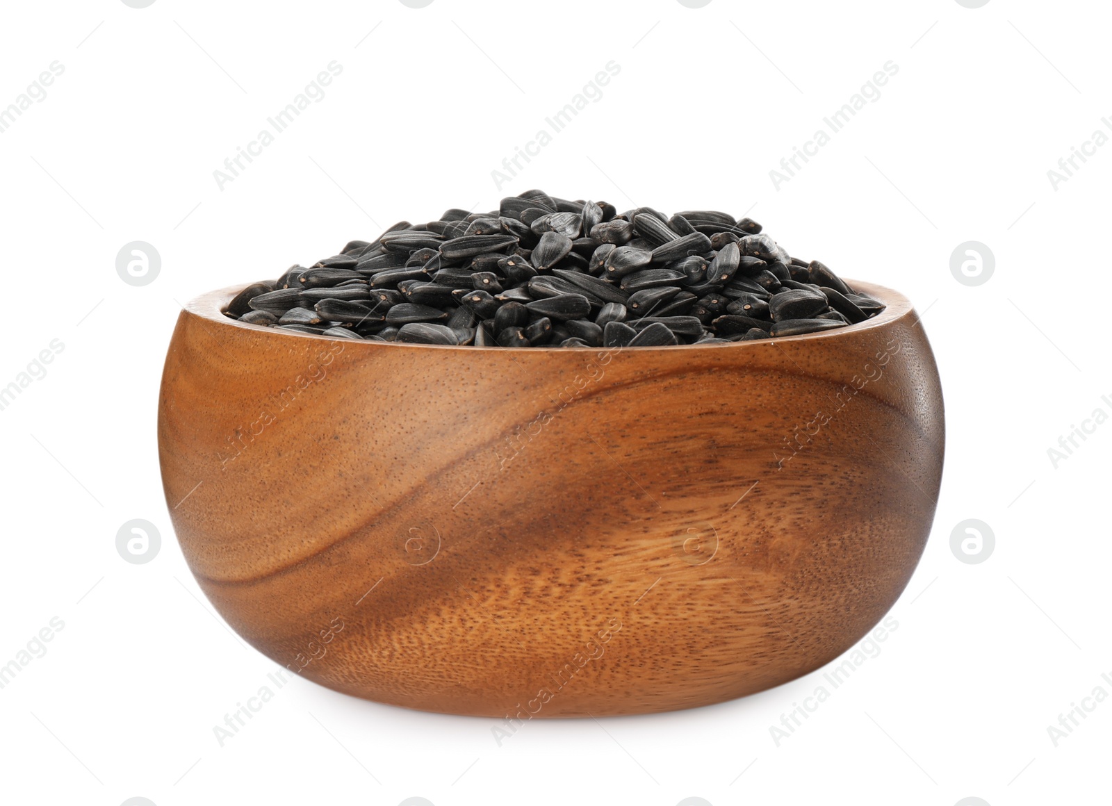 Photo of Sunflower seeds in wooden bowl isolated on white