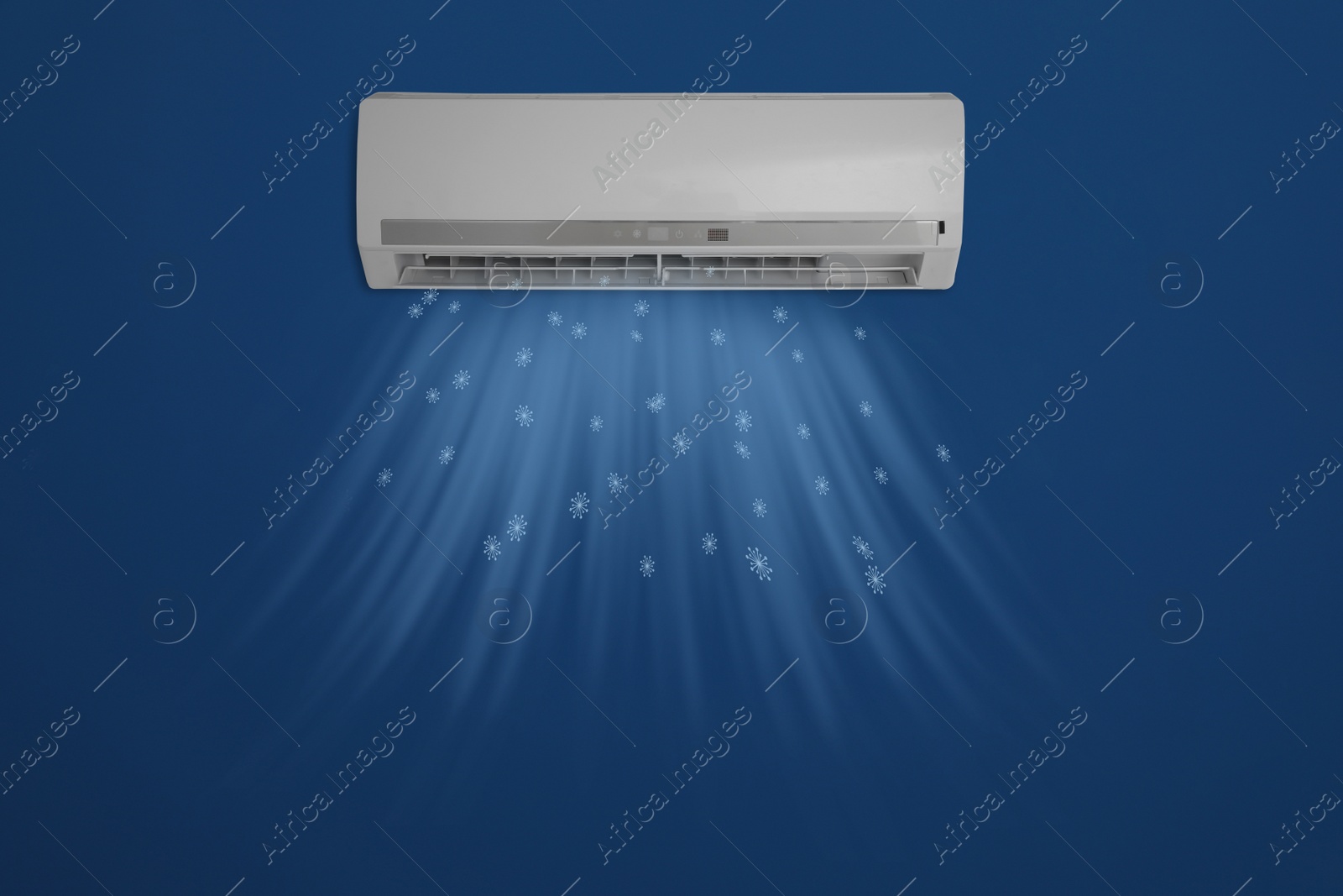 Image of Modern air conditioner on blue wall indoors