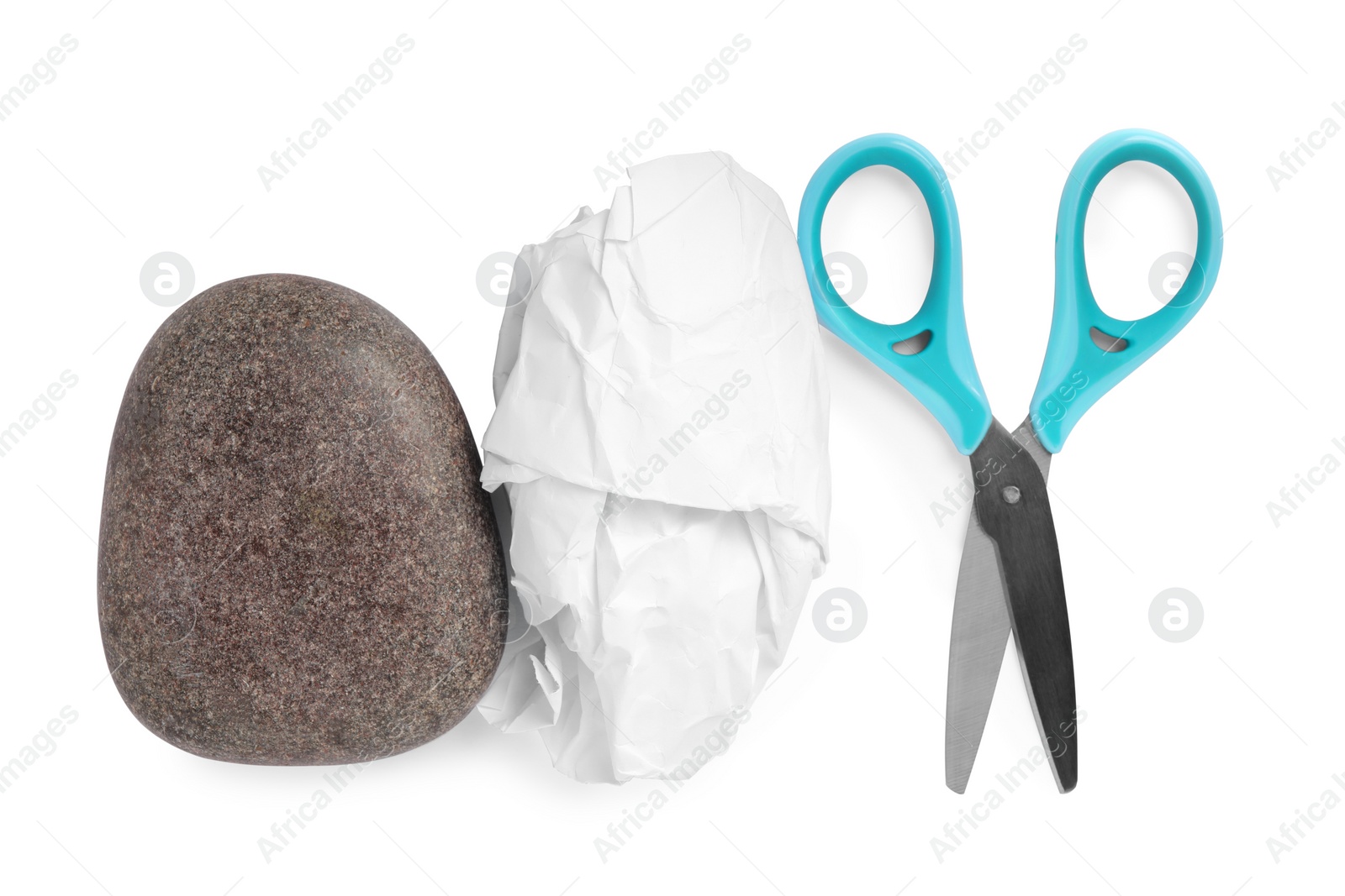 Photo of Rock, crumpled paper and scissors on white background, top view