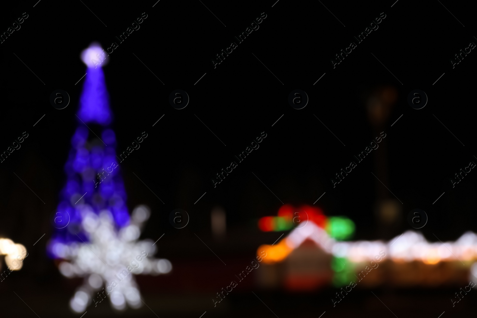 Photo of Beautiful street lights at night. Bokeh effect