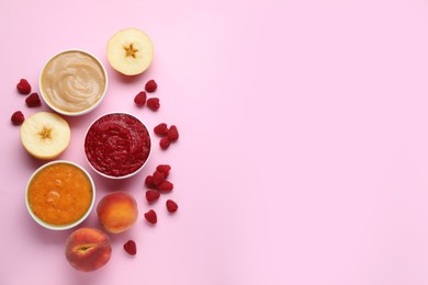 Different puree in bowls and fresh ingredients on pink background, flat lay. Space for text