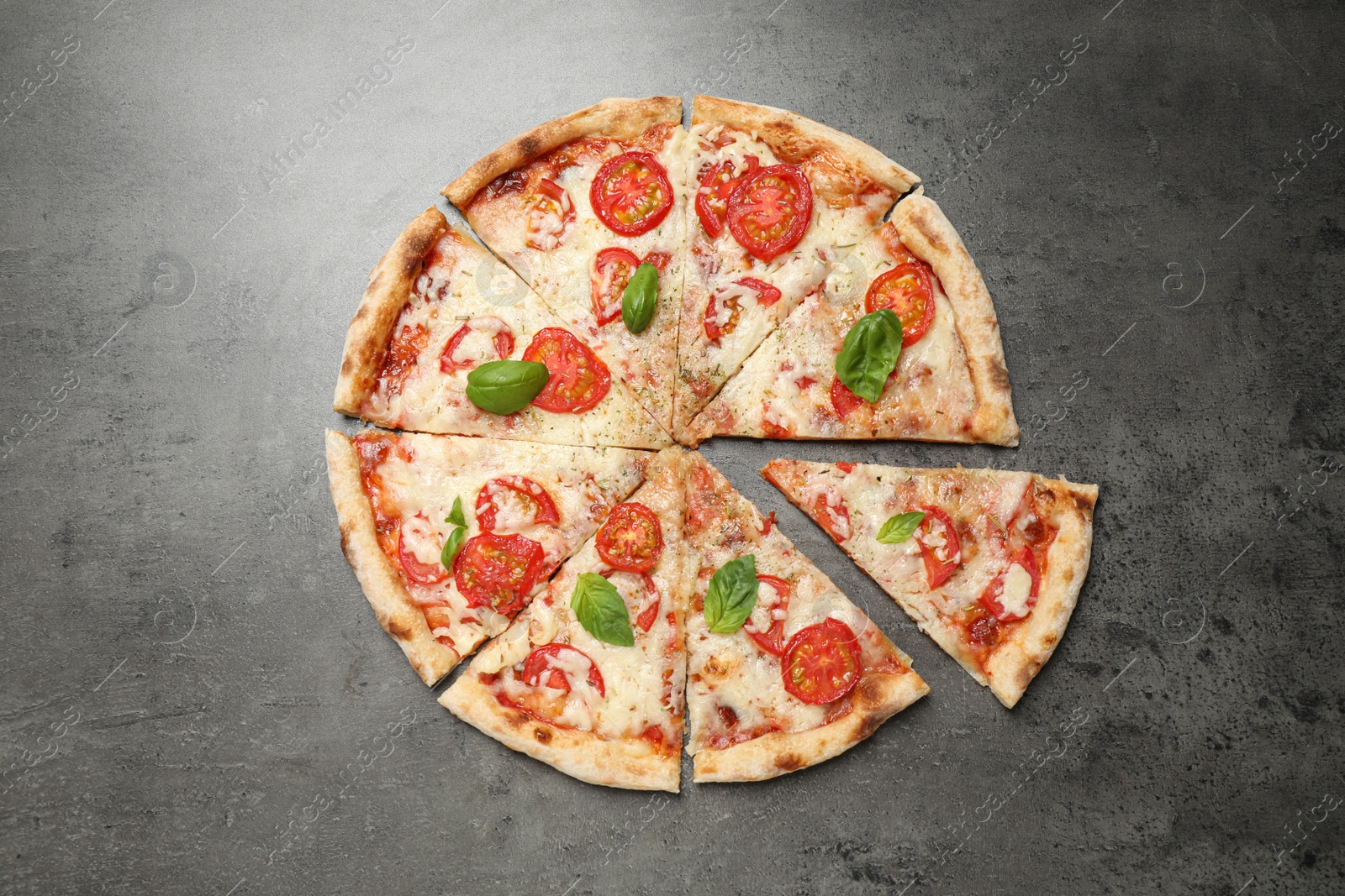 Photo of Delicious pizza Margherita on grey table, flat lay
