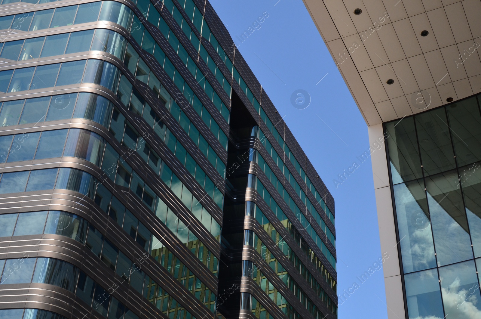 Photo of Beautiful modern buildings in city, low angle view