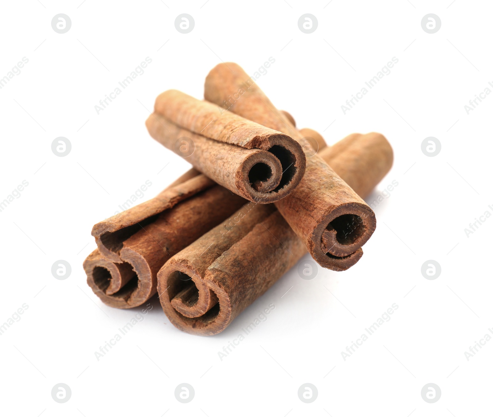 Photo of Aromatic cinnamon sticks on white background