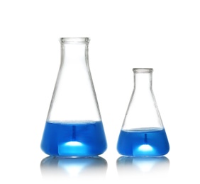 Photo of Conical flasks with liquid samples on white background. Chemistry glassware