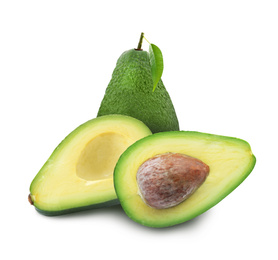 Cut and whole fresh avocados on white background