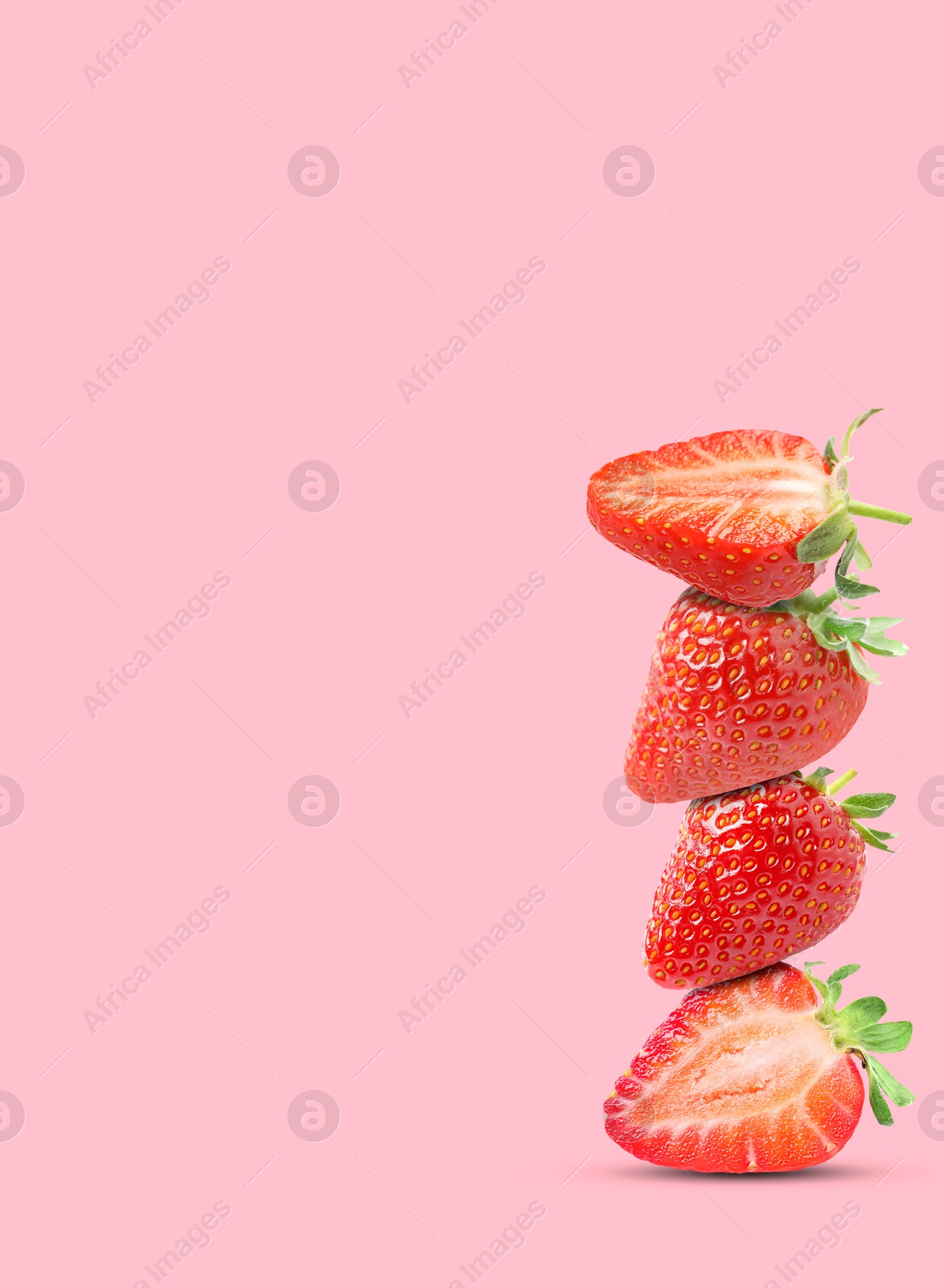 Image of Stack of fresh strawberries on pink background, space for text