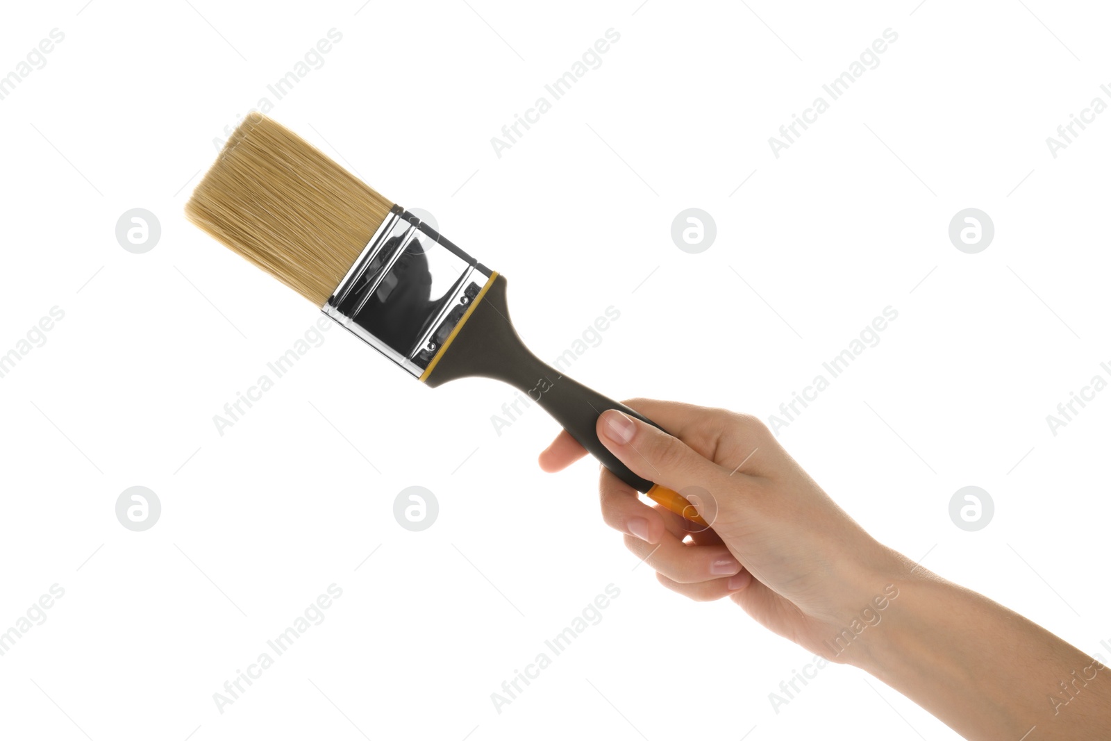 Photo of Woman holding paint brush on white background, closeup